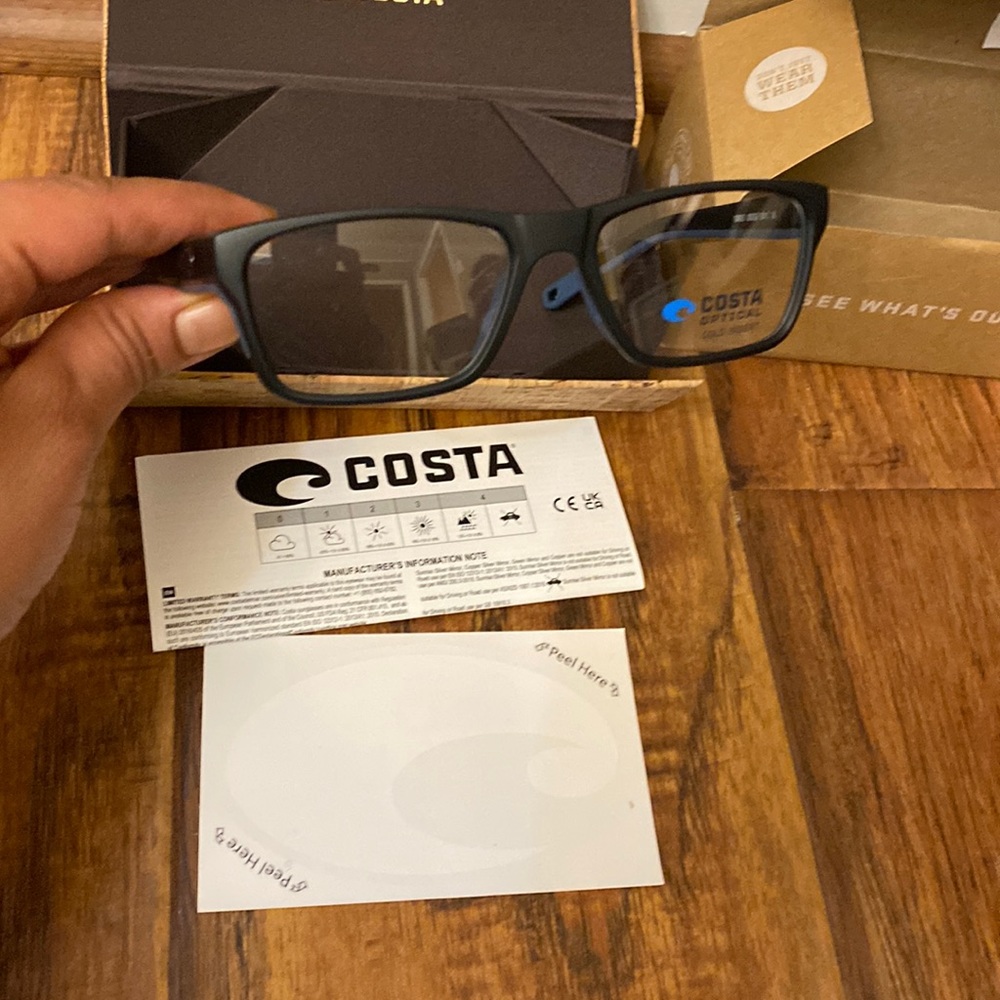 New costa black demo lens glasses with its box